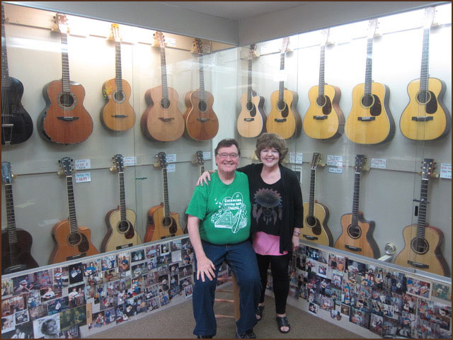 Don & Marty surrounded by hanging guitars