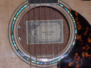 View the album Larrivee Custom LV-10E, Quilted Sapele and Red Sitka Spruce 003, Mahogany/Spruce