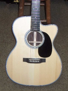 View the album Martin Custom 000-28E, with a cutaway!!!