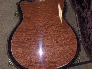 View the album Taylor Custom GSCE, Quilted Sapele & Cedar - SOLD