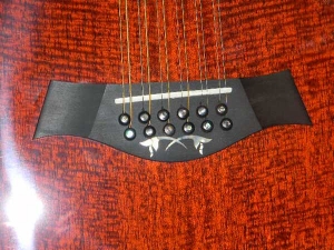 View the album Taylor GSCE 12-String, Florentine Cutaway - SOLD