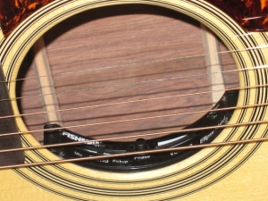 View the album Martin Custom 0000H-28V Cutaway, Madagascar/Adirondack, Fishman Ellipse Blender Pickup