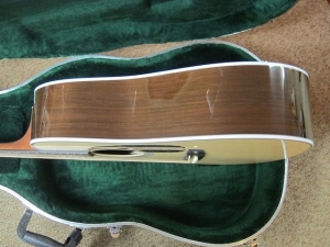 View the album Martin Custom HD-28, Madagascar Rosewood/Adirondack