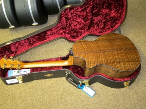 View the album Taylor Custom GACE, Rare, Flamed Walnut Back, Sides, and Top--New Arrival!