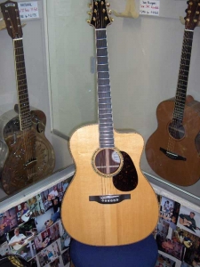 View the album The Cutaway Jumbo OM Custom